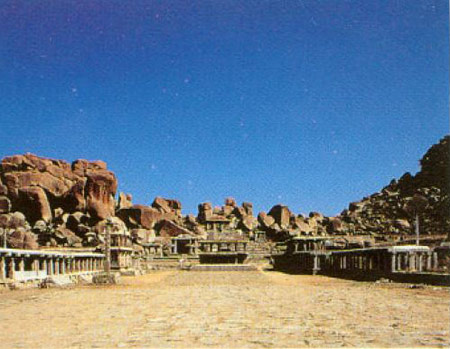 Hampi-Bazaar-With-Palaceground-With-Mountainin-Background2